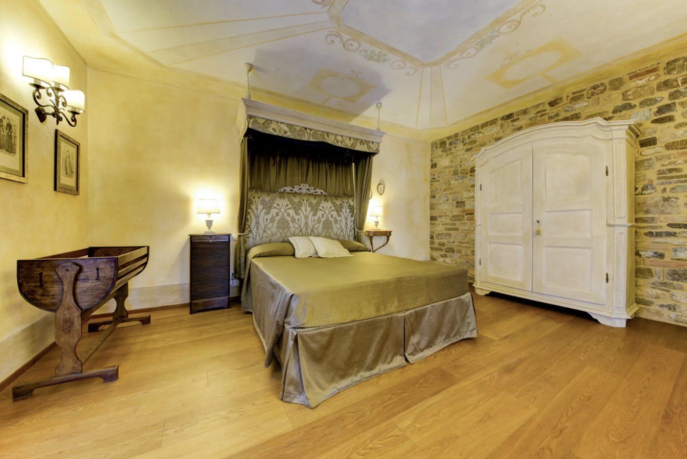 Bedroom with exposed stone wall